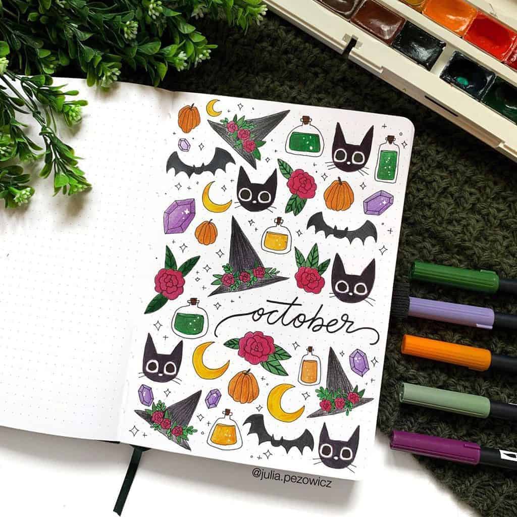 Halloween Bullet Journal Inspirations - cover page by @julia.pezowicz | Masha Plans