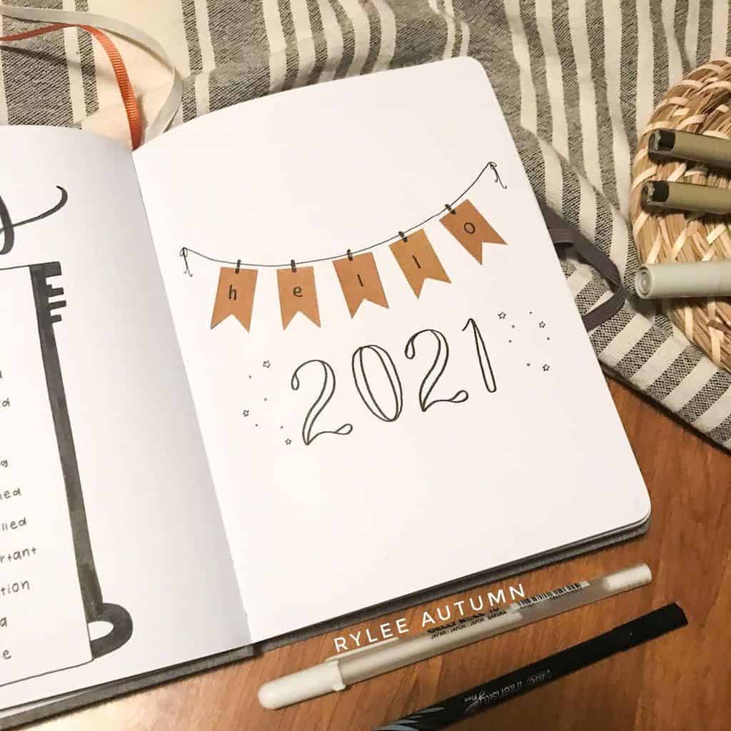 7 Bullet Journal Cover Page Ideas, spread by @ryleeautumn_ | Masha Plans