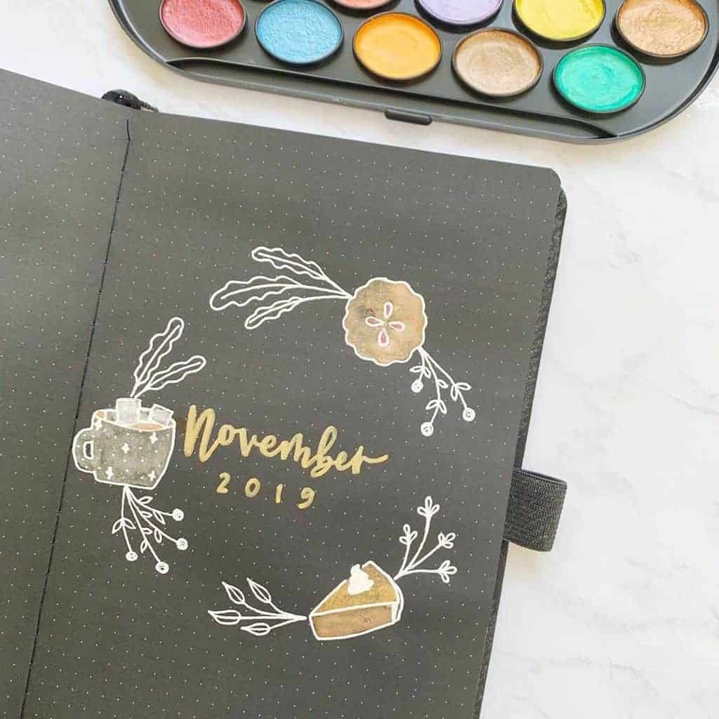 Fall Bullet Journal Theme Inspirations - cover page by @erinflotodesigns | Masha Plans